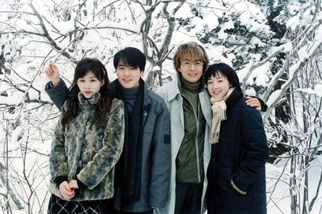 Choi Ji-woo and Yong-jun Bae at an event for Winter Sonata (2002)