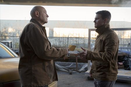 Eugene Lipinski and Stephen Amell in Arrow (2012)