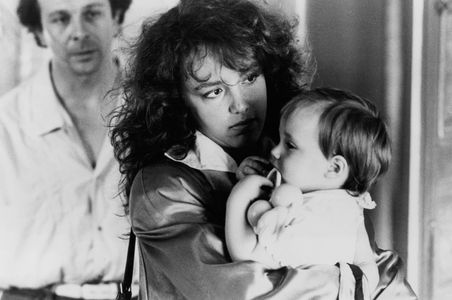Roland Giraud and Philippine Leroy-Beaulieu in Three Men and a Cradle (1985)