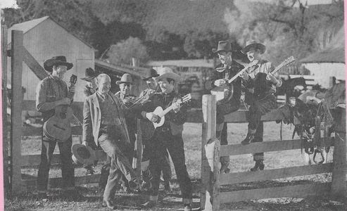 Ken Card, Robert Hoag, Cactus Mack, Frankie Marvin, Willie Phelps, Lee 'Lasses' White, and Ray Whitley in Corralling a S