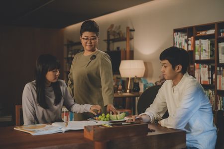 Choi Woo-sik, Lee Jeong-eun, and Jung Ji-so in Parasite (2019)
