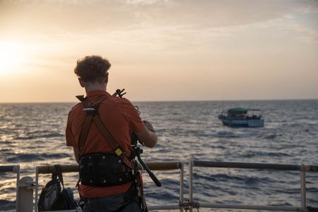 Skye Fitzgerald on location off the coast of Libya.