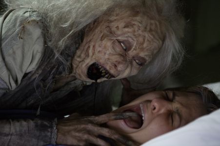 Scout Taylor-Compton and Wen-Chu Yang in Ghost House (2017)