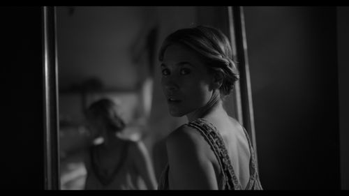 Girl at mirror