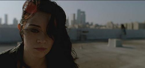 Brenna Otts as Roxy in Dysconnected