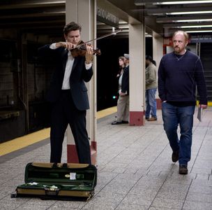 Louis C.K. and Deanna Mustard in Louie: Subway/Pamela (2011)