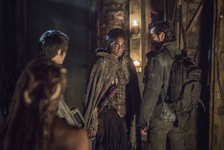 Henry Ian Cusick, Christopher Larkin, Adina Porter, and Tati Gabrielle in The 100 (2014)