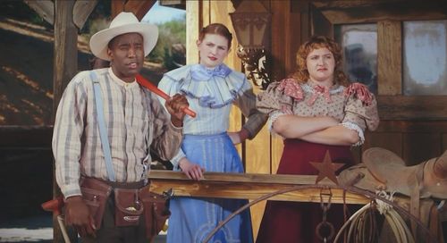 Jessica Ruth Bell, Monika Elmont, and Daniel Dudley on the set of a Western