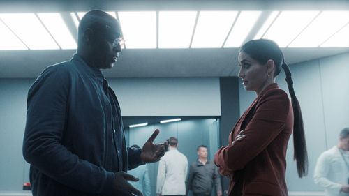 Lance Reddick and Paola Núñez in Resident Evil: Someone's Little Girl (2022)