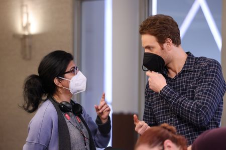 Still of Afia Nathaniel and Nick Gehlfuss on the set of Chicago Med