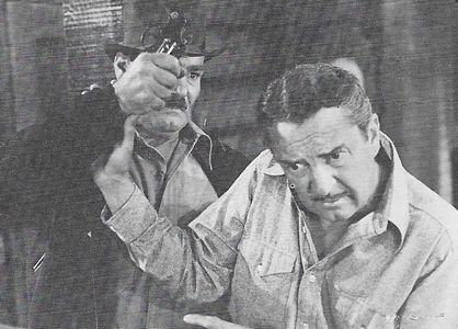 Harry Cording and Bryant Washburn in King of the Royal Mounted (1940)