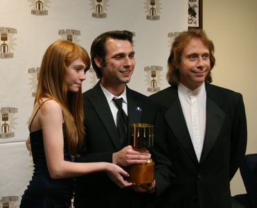 Presenters Liliana Mumy (l) and Bill Mumy (r) with Michal Makarewicz, winner for feature character animation