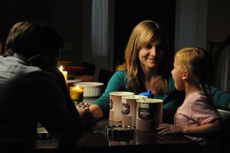 Elizabeth Mitchell, Tim Guinee, and Morgan Hinkleman in the pilot episode of Revolution