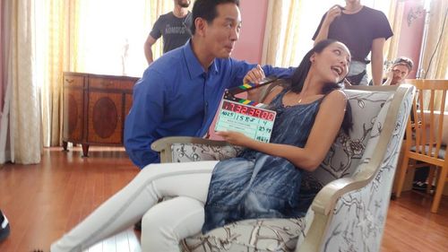 on set of Made In Chinatown, actor- Greg Lee, actress- Shuya Chang