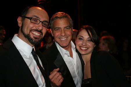 Filmmaker Yoav Potash, actor George Clooney, and Shira Potash at the Nationa Board of Review Awards in 2012. Yoav Potash
