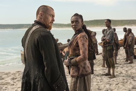 Toby Stephens and Zethu Dlomo-Mphahlele in Black Sails (2014)