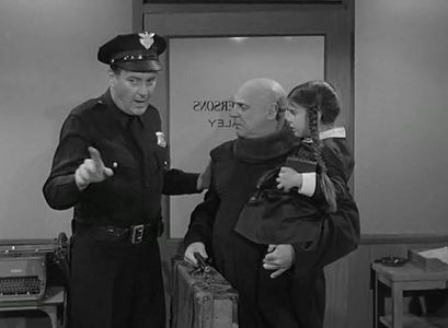 Jackie Coogan, Lisa Loring, and Ray Kellogg in The Addams Family (1964)