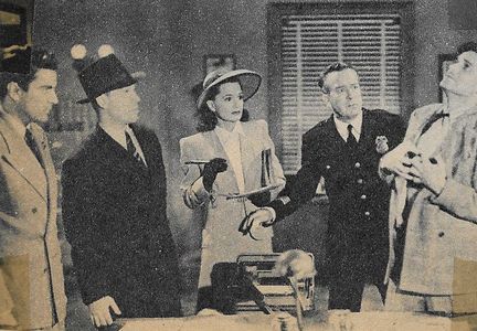 Jack Mulhall, Ella Neal, William Newell, and Robert Wilcox in Mysterious Doctor Satan (1940)