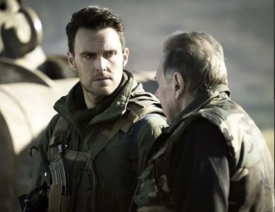 Tom Wilkinson and Owain Yeoman in SAS: Red Notice (2021)