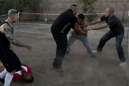 Nick Tims, Yun Young, Mario Loya, Donald A. Perez, and Sal Cartagena in Tough Guy (2023)