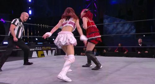 Riho Abe, Rick Knox, and Maki Ito at an event for AEW Dark: Elevation (2021)