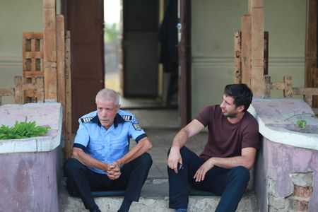 Gheorghe Visu and Dragos Bucur in Dogs (2016)