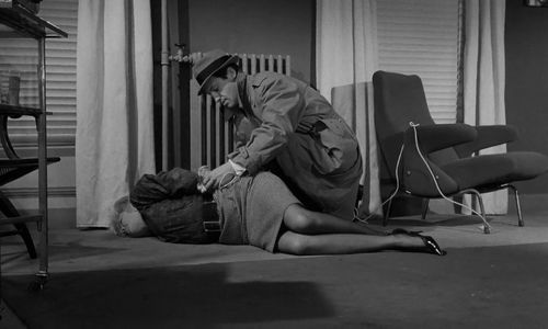 Jean-Paul Belmondo and Monique Hennessy in Le Doulos (1962)