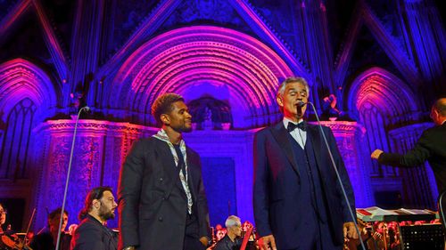 Still grab of Andrea Bocelli and Usher perfroming in Orvieto, Italy.