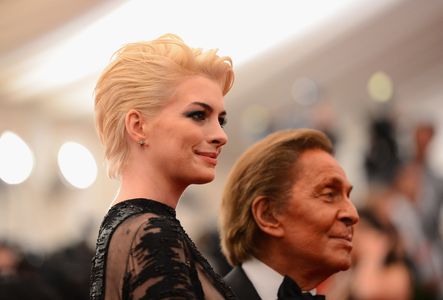 Anne Hathaway and Valentino Garavani