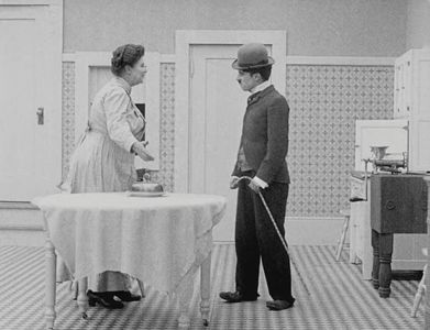 Charles Chaplin and Eva Thatcher in The Count (1916)