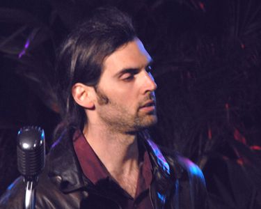 Actor/Director Peter McGennis on stage in Queen City