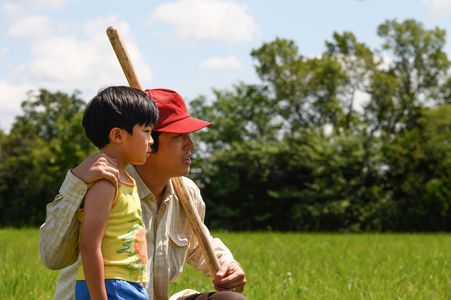 Alan Kim and Steven Yeun in Minari (2020)