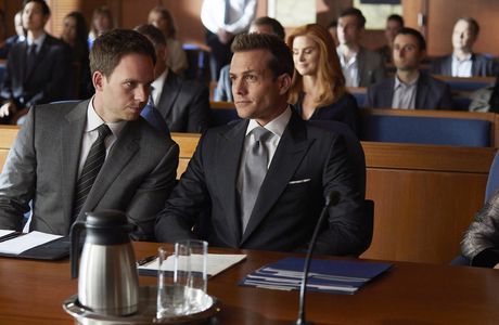 Gabriel Macht, Patrick J. Adams, and Sarah Rafferty in Suits (2011)