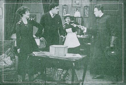 Marguerite Courtot and William Sherwood in The Key to a Fortune (1915)
