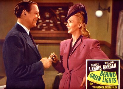 William Gargan and Carole Landis in Behind Green Lights (1946)