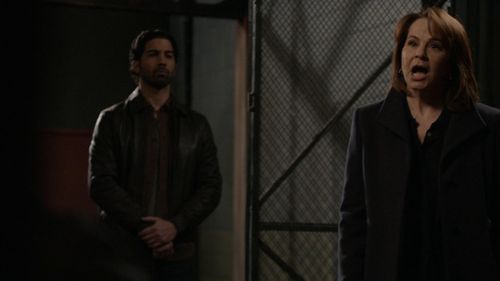 Deirdre Lovejoy and Mario Peguero in The Blacklist: Helen Maghi (No. 172) (2022)