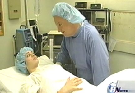 John Vance and Lizzy Caplan in Hardcore Action News (2003)