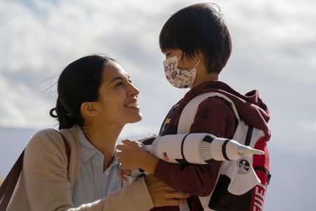 Sebastien LaSalle and Elodie Yung in The Cleaning Lady (2022)