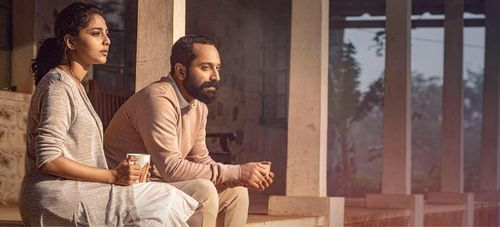 Fahadh Faasil and Aishwarya Lekshmi in Varathan (2018)