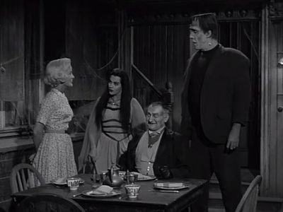 Yvonne De Carlo, Fred Gwynne, Al Lewis, and Beverley Owen in The Munsters (1964)
