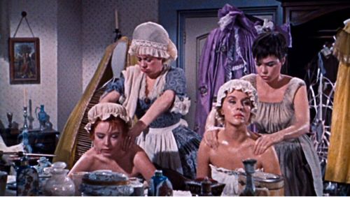 Leslie Caron, Elsa Lanchester, Amanda Blake, and Lisa Daniels in The Glass Slipper (1955)