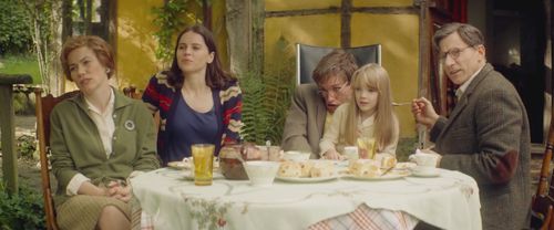 Abigail Cruttenden, Felicity Jones, Simon McBurney, Eddie Redmayne, and Raffiella Chapman in The Theory of Everything (2