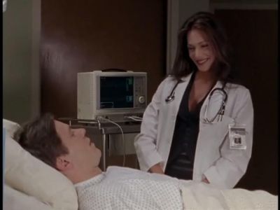 Carlos Jacott and Hunter Tylo in She Spies (2002)