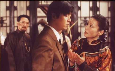 Hong Pan, Yueming Pan, Wei Zhao, and Zhenhai Kou in Moment in Peking (2005)