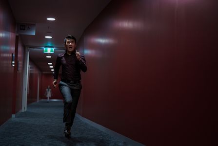 Amie Donald and Ronny Chieng in M3GAN (2022)