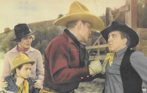Ted Adams, Muriel Evans, Buck Jones, and Dickie Jones in Smoke Tree Range (1937)