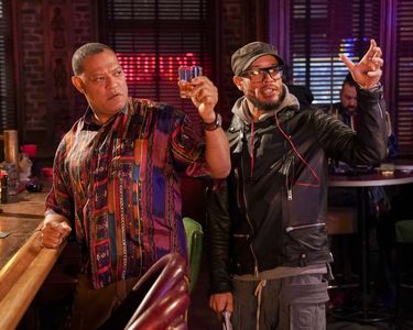 Directing Laurence Fishburne on the set of Black-ish