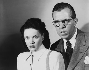 Rudolph Anders and Dona Drake in Dangerous Millions (1946)