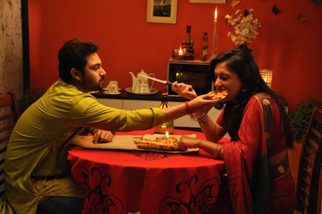 Soham Chakraborty and Mimi Chakraborty in Golpo Holeo Shotti (2014)