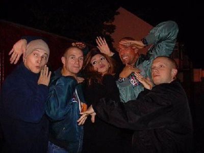 Screenwriter Vekeana Dhillon doing the vogue with the cast of I - Proud to Be an Indian (2004).